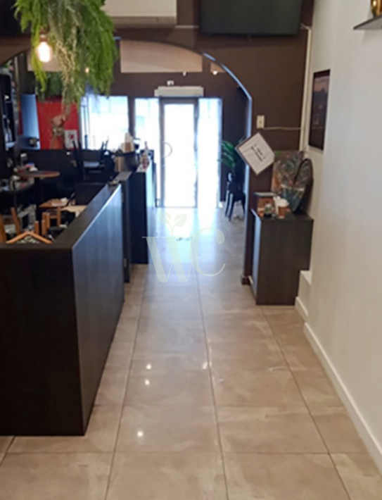 Dirty stained flooring in high traffic area