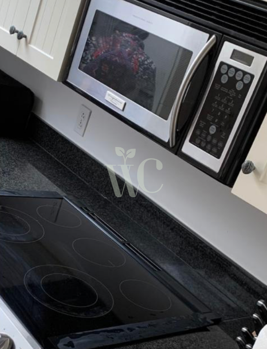 Clean stove top after W.I.H. Clean service.